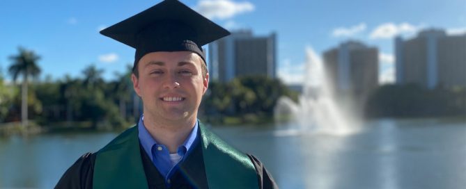 Ben Ezzy dons his graduation cap for a photo on the Coral Gables campus. Photo courtesy of Ben Ezzy.