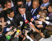 Journalists surround Brazil's President Jair Bolsonaro at the Planalto presidential palace in Brasilia, Brazil, in this 2019 file photo. Photo: The Associated Press