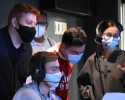 From left to right: Tyler Walsh, Ben Ezzy, Spencer Askinazy, and Jenna Weiss working in the control room during a NewsVision broadcast. Photo courtesy of Tyler Walsh.