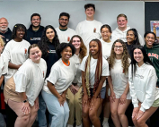 Students who took part in the first Miami Oceans Debate held at the School of Communication pose for a group photo.