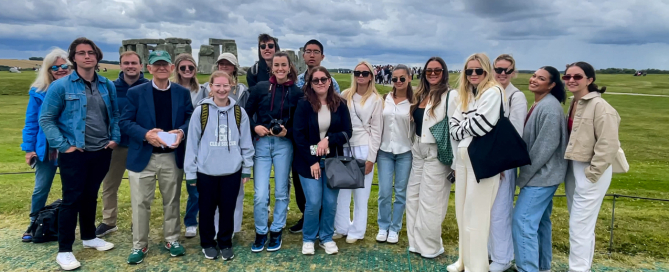 Students taking part in the three week Global Communication, London Summer study abroad program pose in front of Stonehenge.