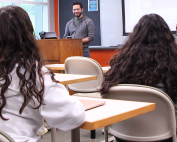 Associate Professor Nicholas Carcioppolo teaches a class to students in the Communication Studies program.