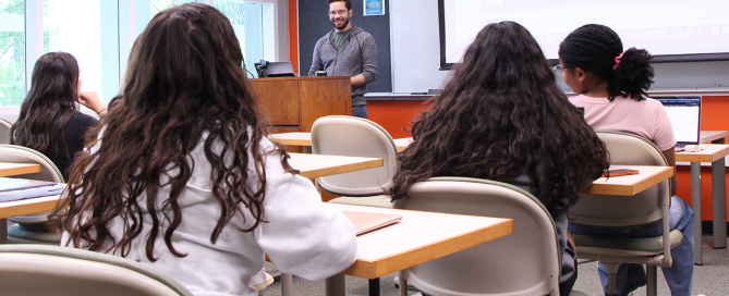 Associate Professor Nicholas Carcioppolo teaches a class to students in the Communication Studies program.