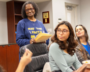 Tsitsi Wakhisi, second from left, associate professor of professional practice, teaches a graduate class on journalism. Photo: Joshua Prezant/University of Miami